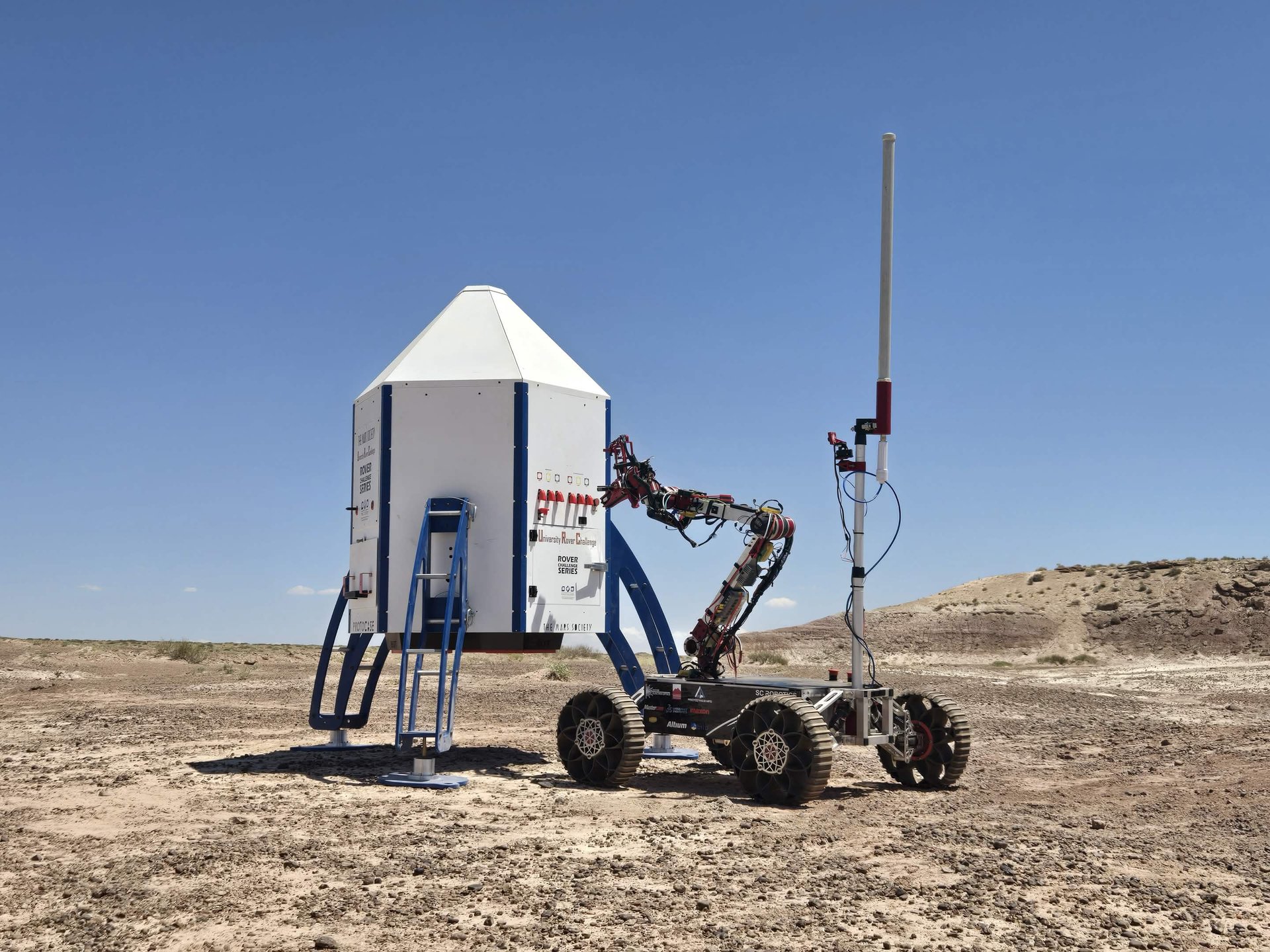 SC Robotics rover performing equipment servicing mission